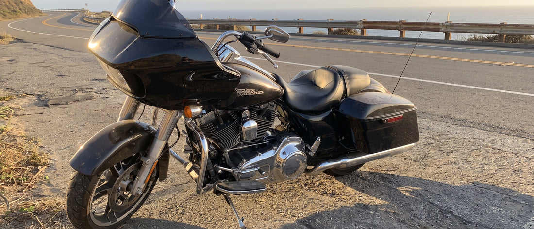 Harley motorcycle seat cover topic: Road Glide parked at a coastal pull-off in late afternoon light