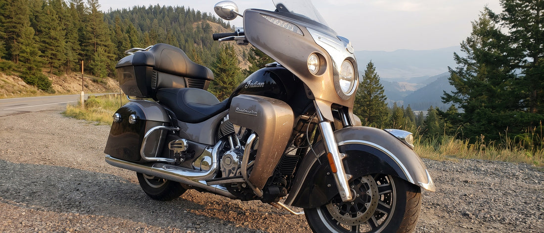 Motorcycle hard covers protecting an Indian Roadmaster saddlebags and tour pack on a mountain switchback